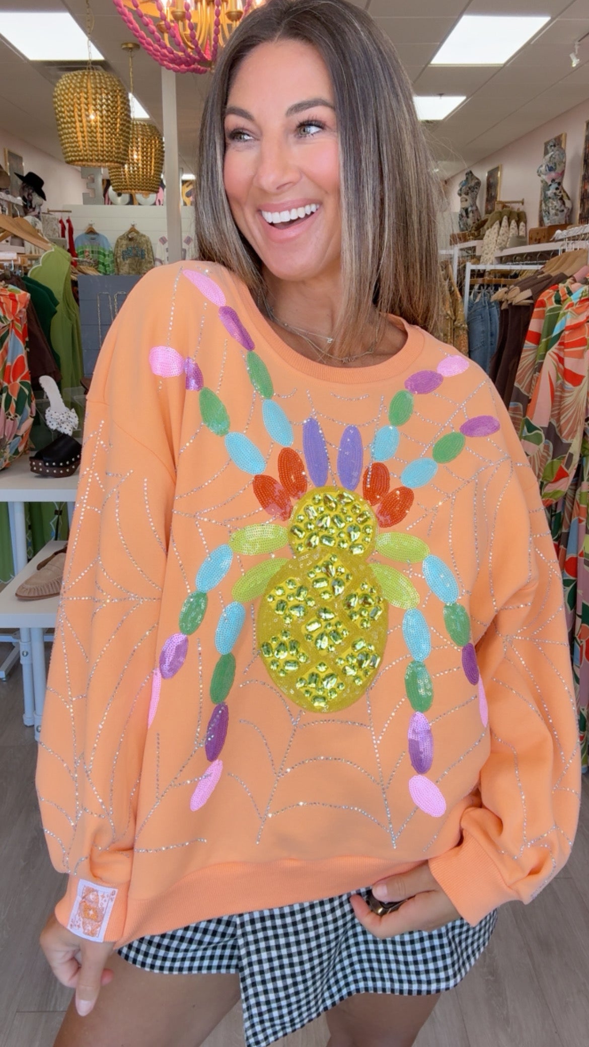Queen of Sparkles | Light Orange Oversized Spider on Web Sweatshirt