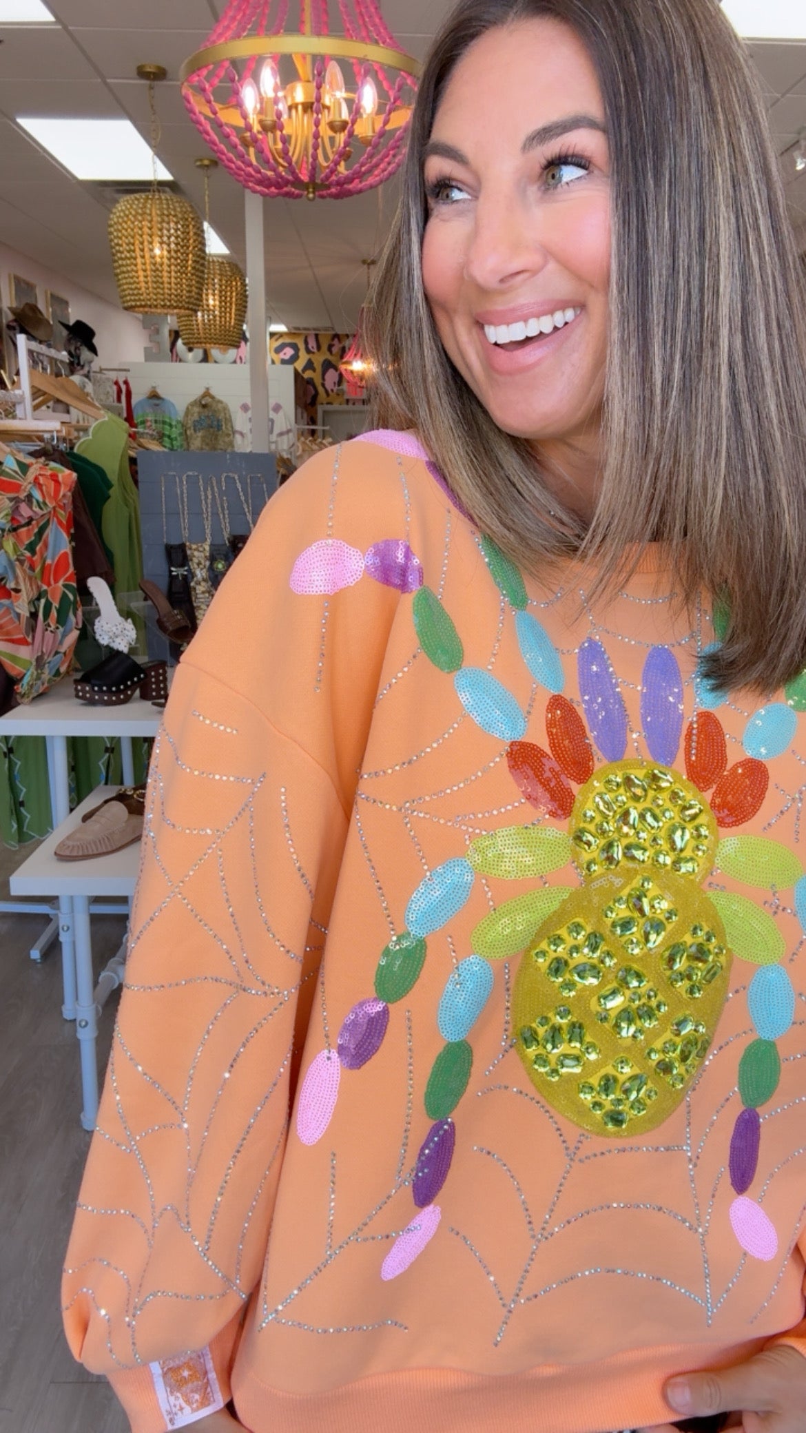 Queen of Sparkles | Light Orange Oversized Spider on Web Sweatshirt