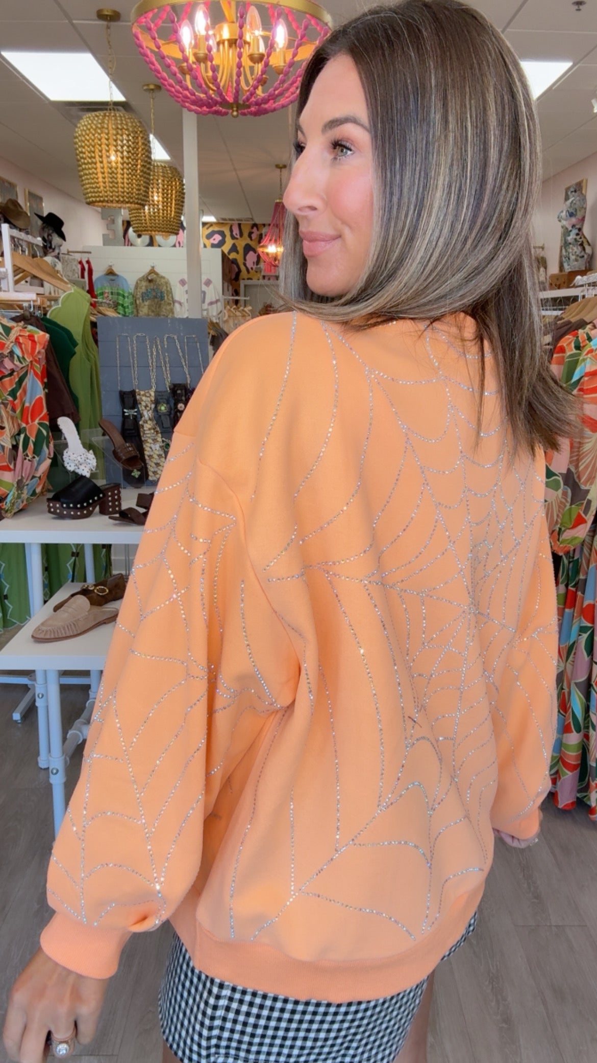 Queen of Sparkles | Light Orange Oversized Spider on Web Sweatshirt