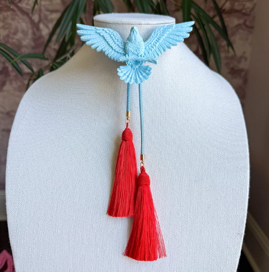 Eagle Bolo Baby Blue with Baby Blue & Red Tassle