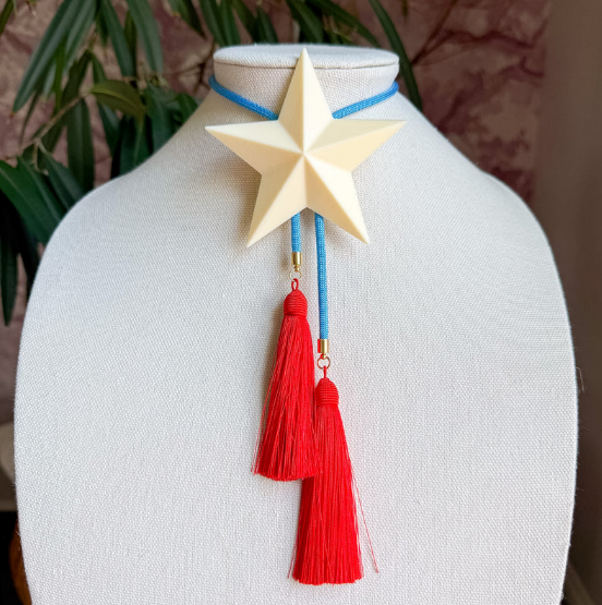 Lone Star Bolo Ivory with Baby Blue & Red Tassle